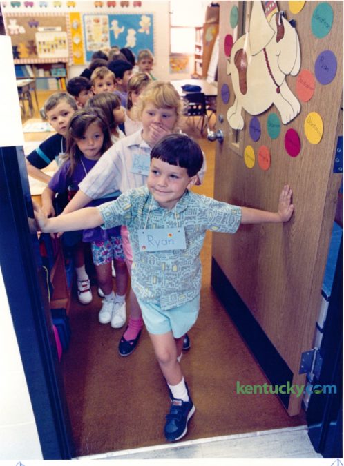Ryan Cook, 6, a first grader at Mill Creek Elementary School waited along with his classmates to go outside for recess on the first day of school August 22, 1991. Today is the first day of school for Fayette County. Photo by Ron Garrison | Staff
