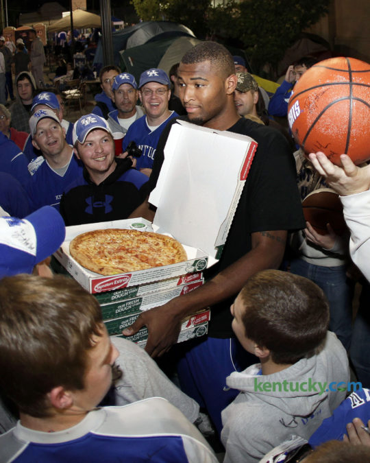 Kentucky basketball player DeMarcus Cousins called out with pizza as UK players served pizza and signed autographs and coach John Calipari signed for fans who were camping out for Midnight Madness on Friday October 2, 2009 in Lexington. The team frequently brings campers pizza during their stay on the grounds outside Memorial Coliseum. This years campout for Big Blue Madness tickets starts at 5 a.m. Wednesday and ends when tickets are distributed at 10 p.m. Friday. Photo by Mark Cornelison | Staff