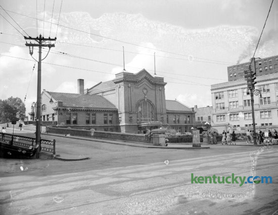 Lexington's Union Station located on Main Street, 1944. It had opened with great fanfare on Aug. 4, 1907, with the arrival of C&O passenger train No. 24. A crowd estimated at 3,000 met the train. The terminal fronted Main Street, just west of Walnut Street, which has been renamed Martin Luther King Boulevard. The exterior was built with red and yellow brick, and green and red glass. The lobby was in the center rotunda, which was 50 by 80 feet, with a central dome 50 feet high. The lobby had a Roman arch ceiling and six oak waiting benches. The last passenger train (the George Washington) departed from the station on May 9, 1957. Union Station was closed because of high operating overhead and low passenger travel. In March 1960, the building was demolished. The current building at the site houses the Lexington Police Department, the Fayette County clerk’s office and the downtown's busiest parking garage, the Annex Garage.