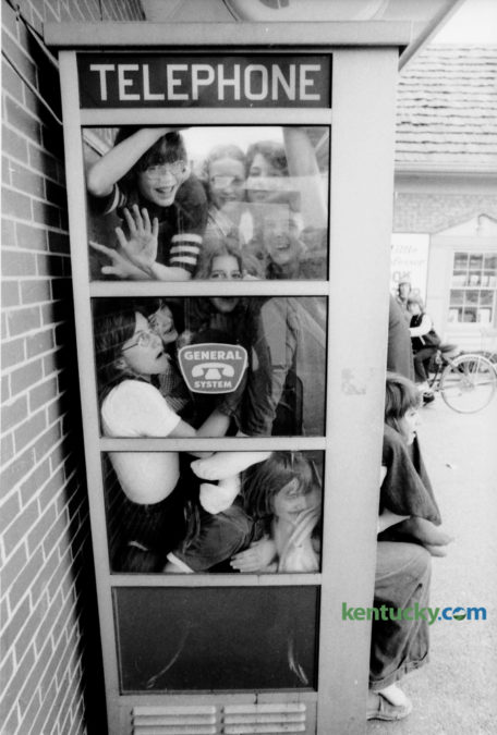 In what was described as an experiment,  a group of Tates Creek Junior High School students decided to see how many people they could fit inside a  phone booth. The result of their experiment resulted in 13 students inside the phone booth, which was at the Lansdowne Shopping Center on Tates Creek Road. Those students that made it inside included, in no particular order, Kathy Borkowski, Mary Beth deCastro, Brawn Sharp, Kelly Hayworth, Brian Sams, Tim Esenbock, Donna Lawson, Jay Rice, Kathy Frank, Karen Linville, Greg LaRue, Neil Welllinghurst and Mark Curry. Photo by Ron Garrison | Staff