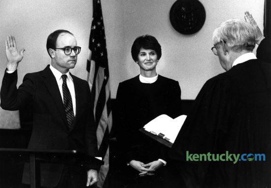 Ray Larson is sworn in as the new Fayette County commonwealth attorney, Jan. 2, 1984 by Judge L.T. Grant as Larson's wife, Betty, looks on. Larson was appointed by Gov. Martha Layne Collins to succeed Larry Roberts, who had been commonwealth's attorney for seven years and who announced in November 1984 that he was resigning to enter private practice. In the brief swearing-in ceremony in front of an overflow crowd of about 175 people at the Fayette County Courthouse, Larson, 40, said he looked forward to the challenge of trying to maintain the level of professionalism for which, he said, Roberts' office had become known. Almost 32 years later, Larson announced Sept. 9, 2016 that he is retiring as Fayette County’s longtime chief prosecutor. Photo by Tom Woods | staff
