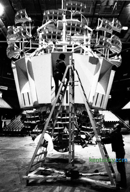 Lexington Center employee Craig King held the ladder for Bob Stoops as he checked the speakers on 'Big Bertha' on March 18, 1985. The speaker cluster had been dropped to the Rupp Arena floor for a complete cleaning prior to the NCAA Final Four tournament later that month.