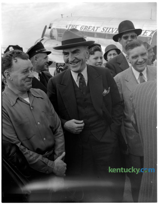Captain Eddie Rickenbacker, center, World War I ace and president of Eastern Airlines, was on hand at the dedication of Bluegrass Field in 1946. Captain Rickenbacker attended the CAP-AFF Air Show in association with the unveiling of the T. Ward Havely Memorial. Rickenbacker was an American fighter ace in World War I and Medal of Honor recipient. With 26 aerial victories, he was America's most successful fighter ace in the war. He was also a race car driver and automotive designer, a government consultant in military matters and a pioneer in air transportation, particularly as the longtime head of Eastern Air Lines. Published in the Lexington Herald-Leader November 10, 1946. Herald-Leader Archive Photo
