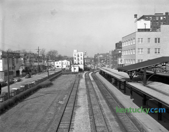 The view looking west down Lexington's Union Station Railroad yards in the winter of 1956. The photo was taken from on top of the Walnut Street (now Martin Luther King Blvd) viaduct. Union Station opened in 1907, and the last train left the station in 1957. The building was torn down in 1960. The tracks were removed in 1968 and Vine Street, which can be seen on the left side of the photo, were widened in their place.