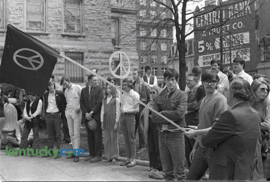 About 100 University of Kentucky students joined the Lexington Peace Council for a silent demonstration April 15, 1970 in front of the Fayette County Courthouse to protest the Vietnam War. Photo by Frank Anderson | Staff