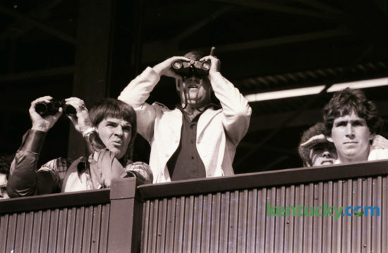 Cincinnati Reds third baseman Pete Rose, left, grimaced while watching the races at Keeneland on October 13, 1976. Rose, relaxing before the World Series, attended the races with a high school pal, Joe Kaiser with binoculars, and shared a box with sportscaster Tom Hammond, rear, and University of Kentucky basketball player Rick Robey. The Reds had won the National League Playoff Series against Philadelphia the day before. The defending champion Reds would face the New York Yankees in the World Series, sweeping the Series to become the only team to sweep an entire multi-tier postseason. Photo by David Perry | Staff