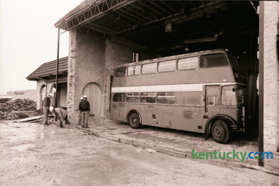 Workmen oversaw the move of an English double-decker bus into the interior of a new restaurant at the corner of Nicholasville Road and Reynolds Road on October 25, 1976. A new restaurant called Darryl's 1891 was being build in what had been the Don Q Restaurant. The new eatery was set to open in early spring of 1977 and promised a full-service menu featuring good food at reasonable prices. The bus was meant to serve as a focal point of the restaurant, creating a unique atmosphere. The Lexington location, now home to the Walgreens at Reynolds Road, closed in January 2002. Photo by Ron Garrison | Staff