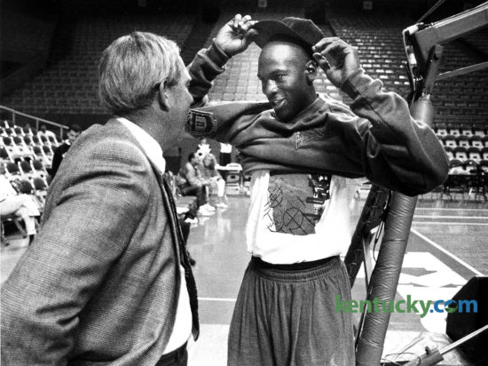University of Kentucky Athletics Director C.M. Newton, left, talked with NBA star Michael Jordan after the Bulls' practice before Chicago's exhibition game, Oct. 15, 1991 at Rupp Arena. A crowd of 20,775, more than double the largest to see a pro game in Lexington, saw Jordan score 20 points in his 22 minutes during the 98-83 win over the Seattle SuperSonics. For all the promise of flying jams and unreal moves to the basket, the moment crystallized on two Jordan free throws (of all things). With 6:04 remaining in the third quarter, Jordan stepped to the line. Flash bulbs accompanied each free throw. A strobe-like effect befitting a rock concert prompted a smiling Jordan to back away from the line. The first for Rupp was old news for Jordan. "I've done it quite a few times," he said of the blinding free throws. "It's not new to me. But everybody got a kick out of it." The crowd got two patented Jordan dunks -- a fast-break stuff early in the first quarter and a leaning right-handed slam in the third. That season, Jordan would go on to lead the Bulls to their second of three consecutive NBA titles. Photo by David Perry |staff