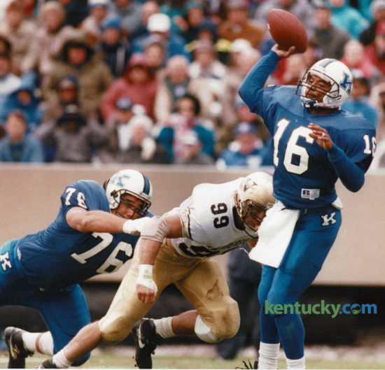 Vandy's Tony Cates got by Kentucky tackle Mark Askin but didn't get to quarterback Pookie Jones before he got the pass off in the Wildcats 20-7 loss at Commonwealth Stadium November 7, 1992. UK went 4 for 7 on the season under coach Bill Curry. Photo by David Perry | Staff