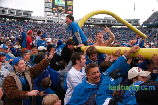 Wildcat fans carried the goal post around the field after it was torn down following the University of Kentucky's upset of Georgia on Saturday November 4, 2006 at Commonwealth Stadium.  Kentucky marched on an 11-play, 69-yard drive for a go-ahead touchdown with 1:21 remaining and then got a game-clinching interception from Trevard Lindley to post a historic 24-20 win over Georgia. It was UK's first win over Georgia since 1996 and sent the Commonwealth Stadium crowd of 62,120 into a post-game, goal post-tearing frenzy. David Perry |Staff