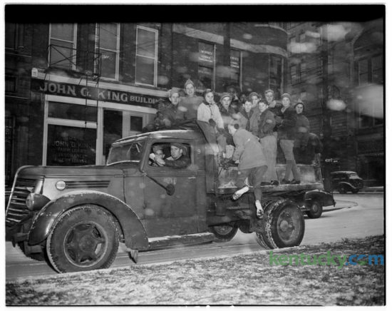 Lexington Boy Scouts collected donated toys in below-freezing weather and falling snow on Nov. 23, 1945. The Scouts planned to repair and redistribute the toys. Published in the Lexington Leader. Herald-Leader Archive Photo