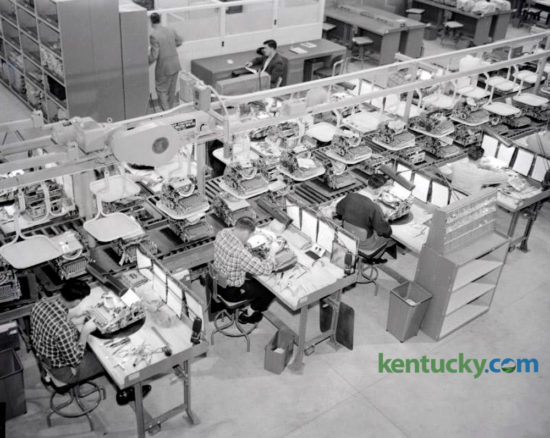 The pilot assembly line at the new IBM plant on December 26, 1956, produced the firm's first electric typewriter to be manufactured in Lexington. W. F. Blackerby, president of Realty Mortgage Company, received the first typewriter, a 16-inch bookcase academic type. He had placed an order that August requesting "the first machine to come from the Lexington plant." IBM, LexmarkÕs industrial forerunner, was the dominant Lexington private employer of its day. In 1956, the company decided to build a 386,000 square foot typewriter plant off New Circle Road that employed 1,800 people. By 1985 IBM had 6,000 workers. In 1990, IBM decided to get out of the printer business. Clayton, Dubilier & Rice, a private New York investment firm that specialized in turning around business divisions bigger corporations discarded, bought the division and appointed Marvin Mann, then with IBM, as chairman and CEO of Lexmark. The company remained headquartered in Lexington at the plant site on Newtown Pike. In April 2016 it was announced that Lexmark was being acquired by a three-pronged Chinese consortium. On Nov. 29, 2016, the acquisition was completed, and the company announced it was shedding its enterprise software business, once the cornerstone of its business strategy. Herald-Leader Archive Photo