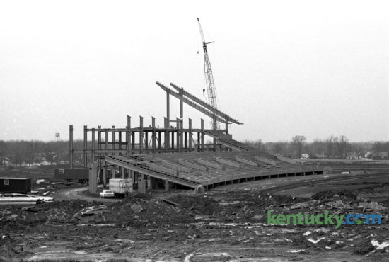 Construction on what would become Commonwealth Stadium, home for University of Kentucky football games, as seen in mid December 1972. When construction was completed in 1973, Commonwealth Stadium had a capacity of 57,800. It was built  at a cost of $12 million by the firm of Huber, Hunt, and Nichols. The stadium and parking areas rest on an 86-acre plot that was once part of the UK Experimental Station Farm Grounds. The stadium was officially opened on Sept. 15, 1973, as the Wildcats moved into their new home after spending 48 years at Stoll Field/McLean Stadium across from Memorial Coliseum. Kentucky defeated Virginia Tech in the stadium opener, 31-26, as quarterback Ernie Lewis ran for two touchdowns and threw for another TD to lead the Wildcats. Published in the Lexington Herald December 14, 1972. Herald-Leader Archive Photo