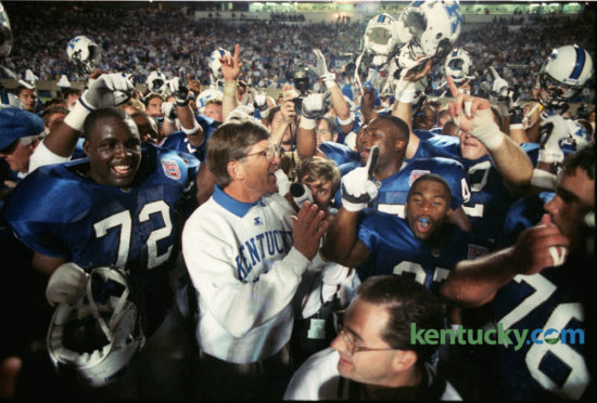 University of Kentucky football coach Bill Curry celebrated with his team after they defeated the University of Louisville 20-14 in the first meeting of the two teams in 70 years on September 3, 1994 in Commonwealth Stadium. The all-time rilvary is tied at 14-14, although Louisville leads the modern series 14-8. The Wildcats and the Cards meet today at noon at Papa John Stadium in Louisville. Photo by Charles Bertam | Staff