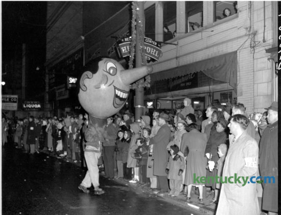 The Lexington Herald reported that 100,000 people braved a cold rainy night on December 1, 1949 to watch the downtown Christmas Parade. Police reported that the parade route from Third and Midland through Main Street to West Second and Broadway was packed solid. This year's Christmas Parade will be held downtown tonight starting at 7pm. Herald-Leader Archive Photo