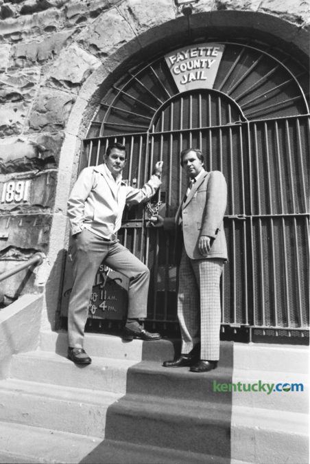 Fayette County Attorney E. Lawson King, left, and Jailer Harold Buchignani, locked up the old Fayette County Jail, built in 1891, on Short Street on October 10, 1976.  One hundred and twenty-four prisoners were transported from this old jail on Saturday October 9, to the new $6.4 million Fayette County Detention Center on Corral St.  By 1989 the new facility, designed to hold 574 inmates was consistently over-populated and a federal judge ordered the city to fix the problem. The current jail, off Old Frankfort Pike, was the solution and was completed in 2000. The $62 million facility was capable of holding 1,200. On October 21, 2000 450 inmates were moved from the downtown jail to the new one on Old Frankfort Pike. Photo by Ron Garrison | Staff