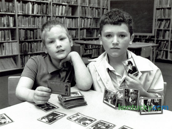 Soon to be fourth graders, Jason DeNoyelles, left, and Damion Reid with their collection of Return of the Jedi cards at Ashland Elementary School on May 15, 1984. DeNoyelles had been collecting for about two years and had about 100 cards. Reid had 185 cards and started collecting a year before when he lived in New York. He had been trying to find a Death Star card and had bought several packages of cards, but that particular one has not been in them.    He said he planned to keep the cards. "When I'm about 20 they'll be worth a lot," he said. The latest installment of the Star Wars series, "Rogue One", opens in Lexington theaters tonight. Photo by John C. Wyatt | Staff