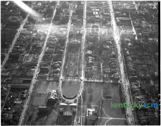 Aerial view of area of downtown Lexington around Gratz Park, center, in February 1951. Old Morrison on Transylvania's campus is seen, bottom center. The Lexington Leader published the photo to illustrate a story about a proposed "downtown distributor" street that was being advocated in a major street plan to be presented to the city-county planning and zoning commission. This part of the route was to start at Limestone, on the left, and would've gone just beyond Broadway. It was to bisect historic Gratz Park. Residents of the park were expected to present their objections to the new street at a meeting of the zoning commission Thursday March 1. The "distributor " was proposed to facilitate movement of traffic to the downtown area from residential sections of Lexington. The proposed route was to run from Forest Avenue to Georgetown Street.   Herald-Leader Archive Photo