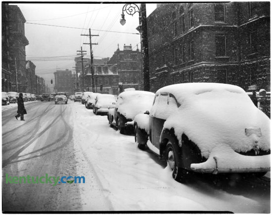 A pedestrian crossed Short Street behind the Fayette County Courthouse during a Dec. 5, 1945 snow storm. Four and one-half inches fell on Lexington, with some parts of the county reporting  seven inches. Fayette County schools were closed the following day, but city schools were open. Herald-Leader Archive Photo