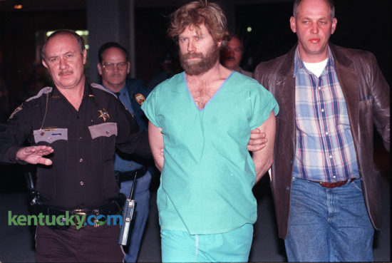 Ralph Baze, center, was taken to the Montgomery County Regional Jail on January 30, 1992. Baze was arrested at Mary Chiles Hospital in Mt. Sterling after being treated for a gunshot wound. Baze was convicted and sentenced to die. He was scheduled for execution in 2007 but was issued a stay after he sued on the grounds that execution by lethal injection using the "cocktail" prescribed by Kentucky law constitutes cruel and unusual punishment. The United States Supreme Court rejected that claim in 2008. He later challenged Kentucky's clemency system but lost his appeal in 2015. He is incarcerated on death row in Kentucky State Penitentiary in Eddyville. Photo by Ron Garrison | Staff