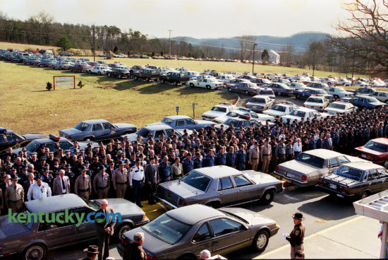 About 700 law officers from Kentucky, Ohio and Indiana attend the funerals for Powell County Sheriff Steve Bennett and Arthur Briscoe, his deputy and brother-in-law, Feb. 2, 1992 in Stanton. The two were shot and killed three days earlier after Briscoe tried to serve a warrant on Ralph Baze Jr. for officials in Toledo, Ohio. Baze opened fire on them with a SKS assault rifle, then took their guns and fled into the hills. "The sheriff's car is riddled with bullets," said Ed Robinson, a spokesman for the Richmond state police post. Baze gave himself up eight hours later by calling a 911 emergency number from near Ravenna about 10 miles away in Estill County. He said he had been shot and asked police to come get him. The shootings left the county with one full-time deputy, Judge-Executive Forest Meadows said. Three days later mourners filled the Powell County High School gymnasium for the afternoon service. Almost 700 officers in uniforms of brown, blue, gray and green filed in, filling the home-side bleachers. The procession to the cemetery stretched more than a mile. Baze was convicted and sentenced to die. He was scheduled for execution in 2007 but was issued a stay after he sued on the grounds that execution by lethal injection using the "cocktail" prescribed by Kentucky law constitutes cruel and unusual punishment. The United States Supreme Court rejected that claim in 2008. He later challenged Kentucky's clemency system but lost his appeal in 2015. He is incarcerated on death row in Kentucky State Penitentiary in Eddyville. Photo by Frank Anderson | staff